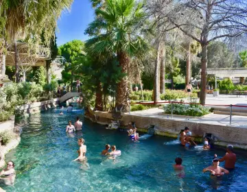 Bathers in hot spring of Cleopatra Antique Pool Pamukkale