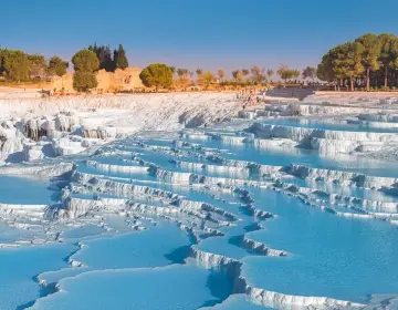 White and blue panorama of Pamukkale terraces and pools