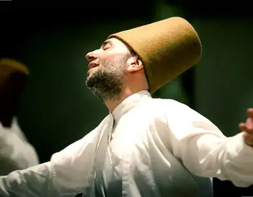 Whirling Dervish performing Sufi dance at Hodjapasha
