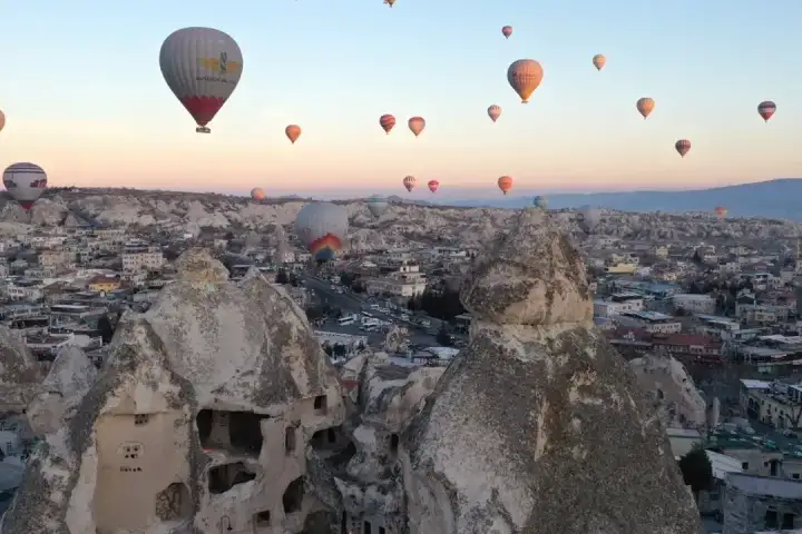 Balloon journey over snowy Cappadocia peaks