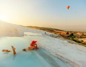 Hot air balloon ride over Pamukkale travertine terraces