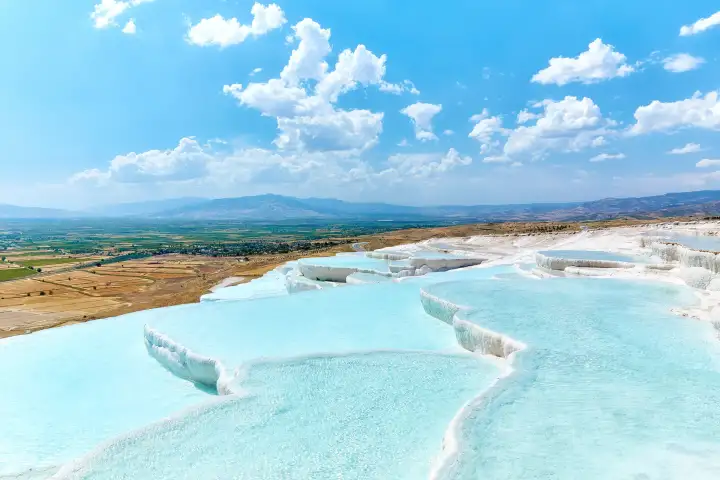 Sunny day view of Pamukkale Cotton Castle nature terraces