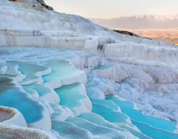Blue terraces and calcite pools of Pamukkale Cotton Castle